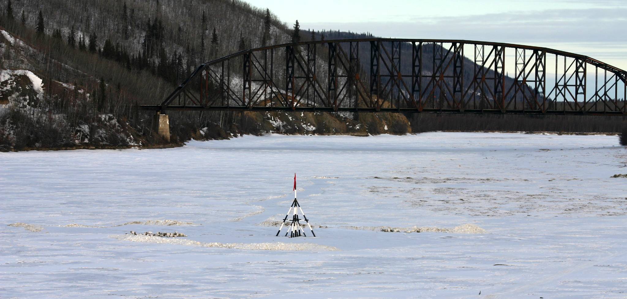 The highway crosses the Tanana River near the tiny town of Nenana, home to the Nenana Ice Classic. Every year a state-wide contest is held to see who can guess the moment the ice breaks for the spring. The winner gets thousands; in 2010, the grand prize was $279,030. (Wikimedia Commons) 