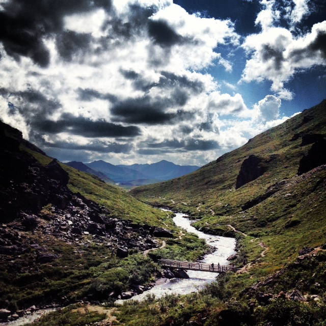 A river runs through a valley