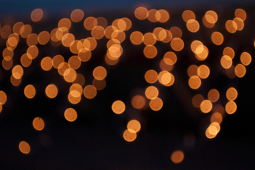 Floating golden holiday lights in Alaska