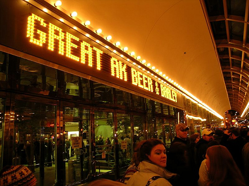 readerboard reads 'Great AK Beer & Barley' at night in downtown Anchorage.